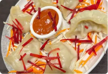 Delicious Steamed Momo - Signature Dish at RARA Kew